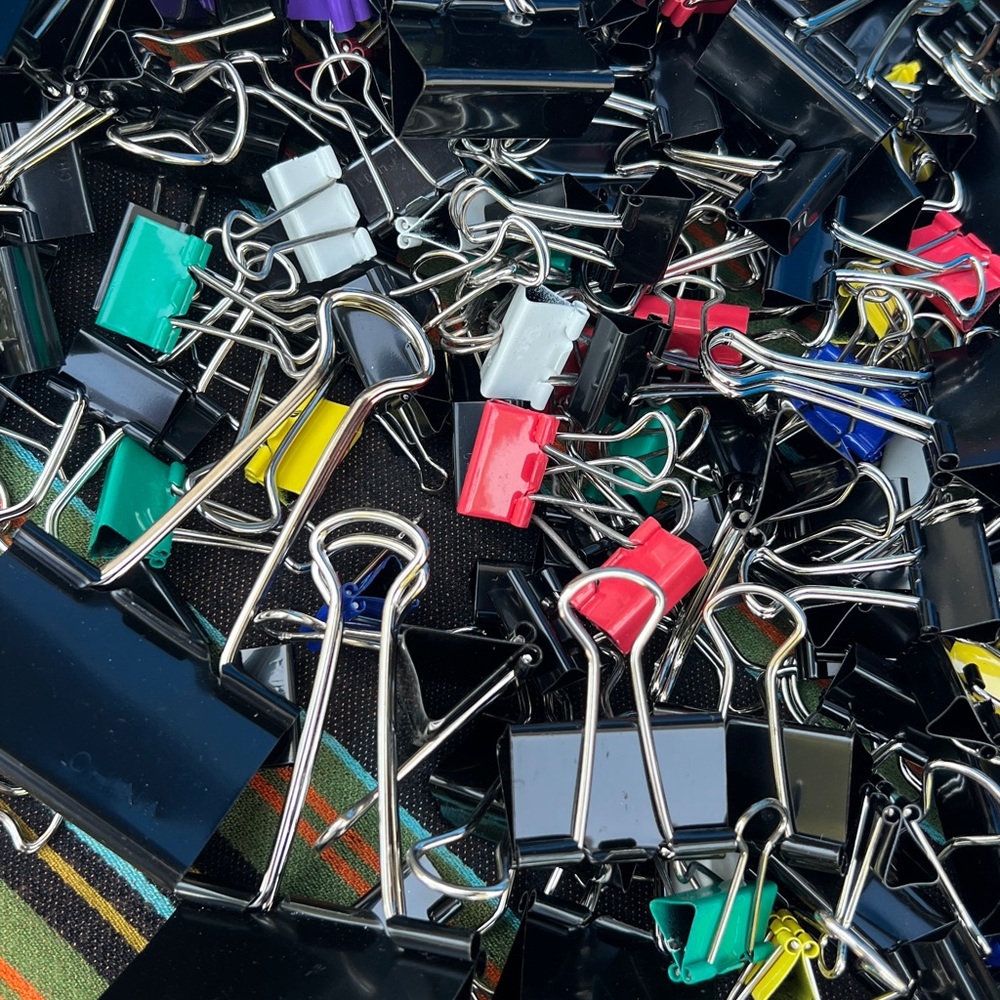 100 plus binder clips in assorted sizes and colors